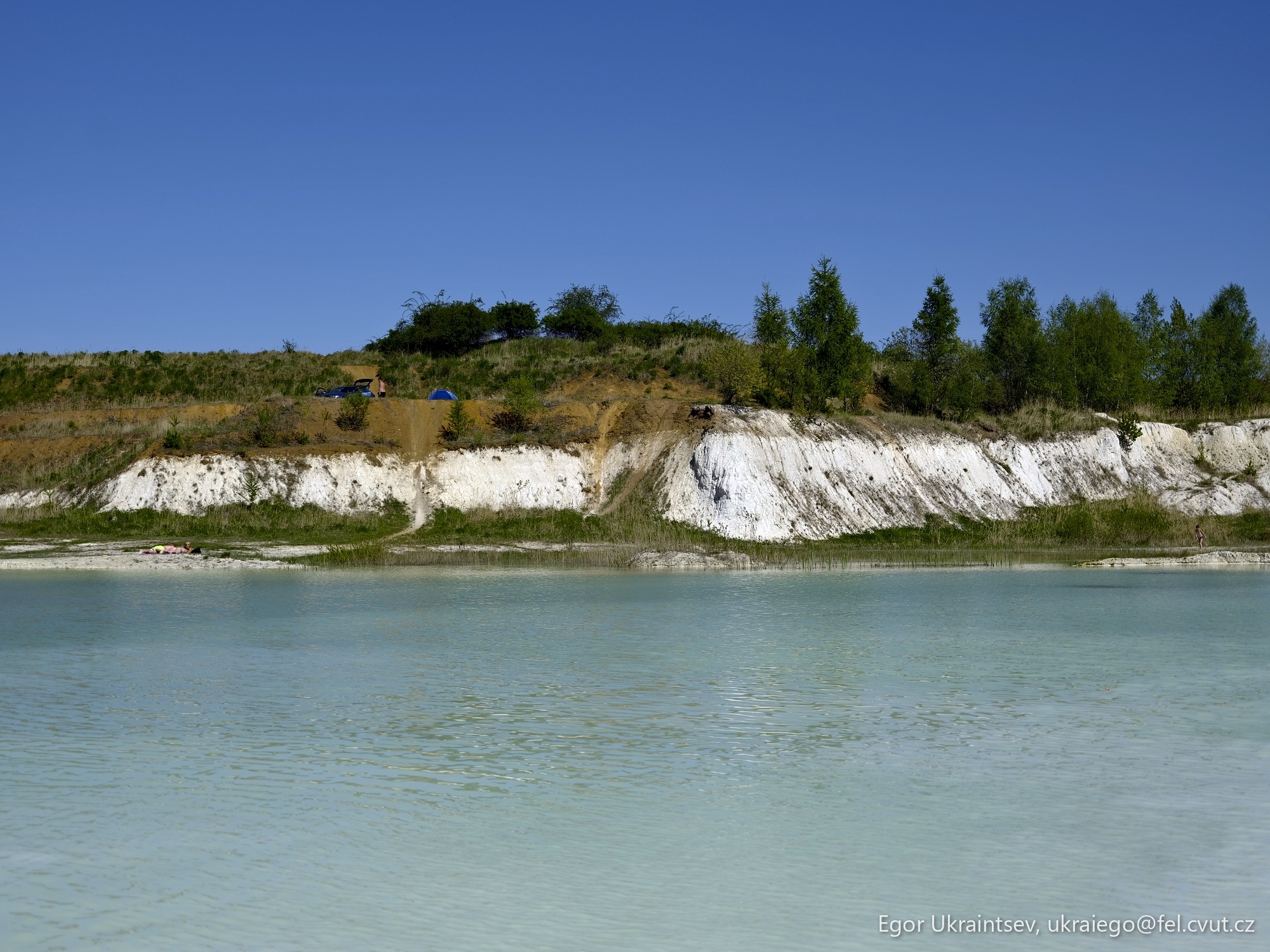Blue lake with white cliffs