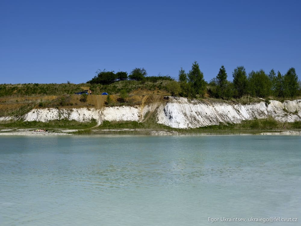 Blue lake with white cliffs