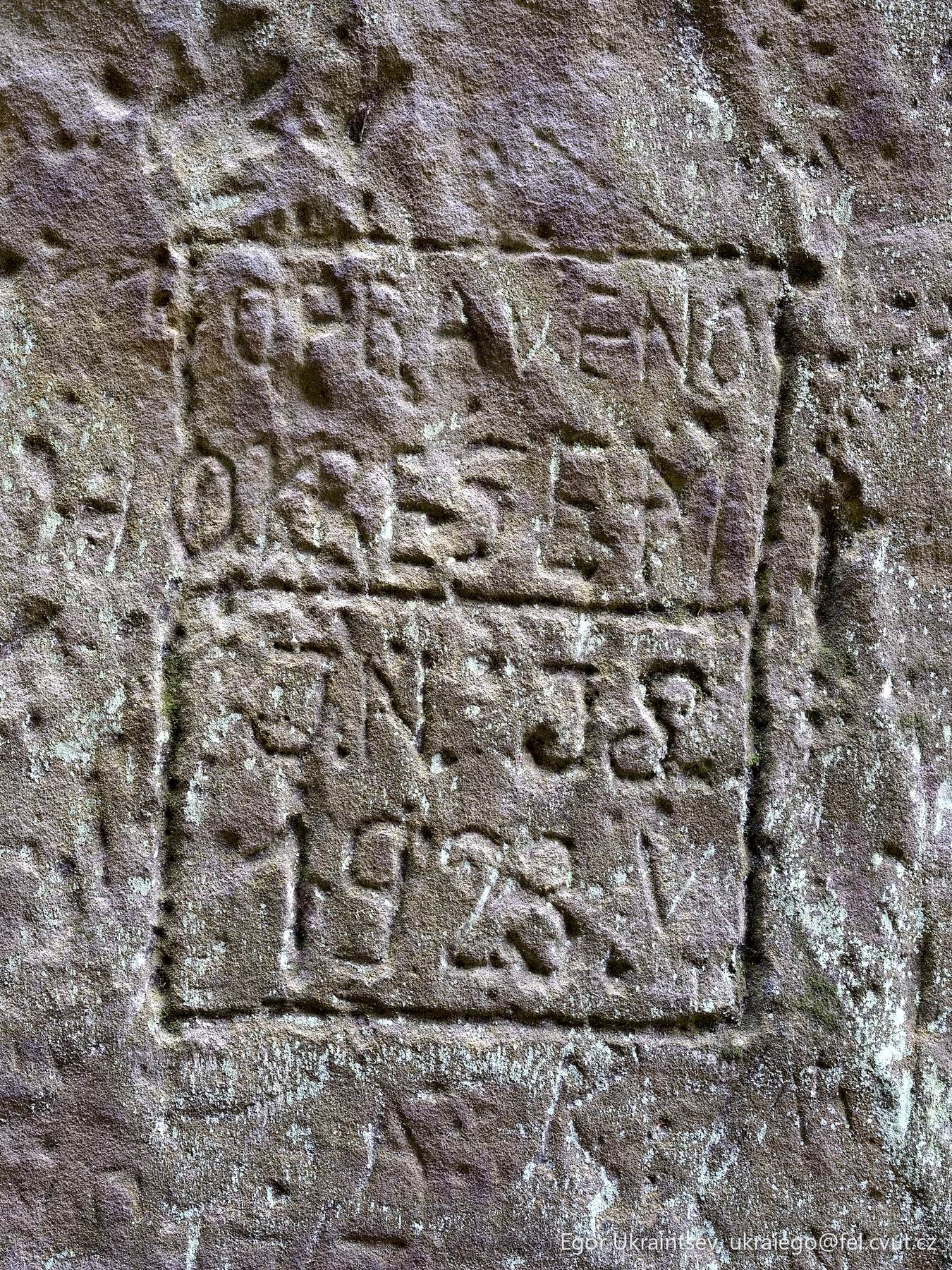 Stone wall with the inscription