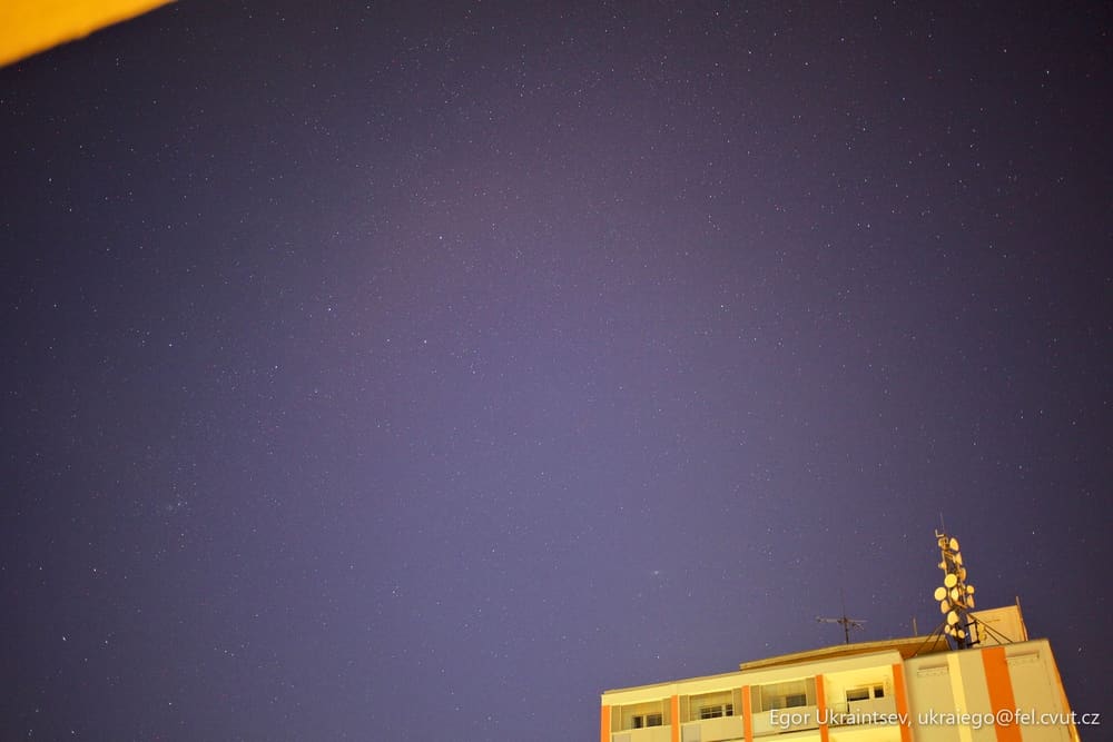 Building at night with stars