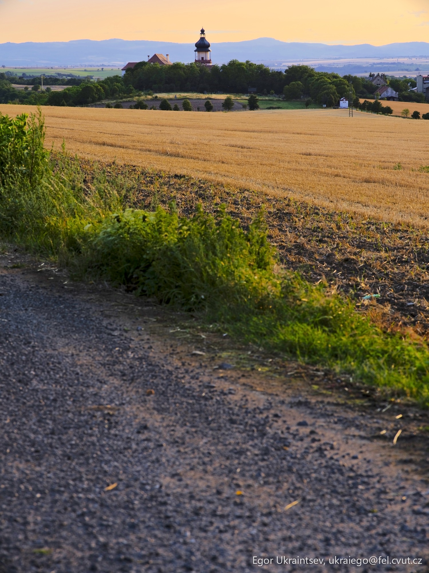 Rural road with a church