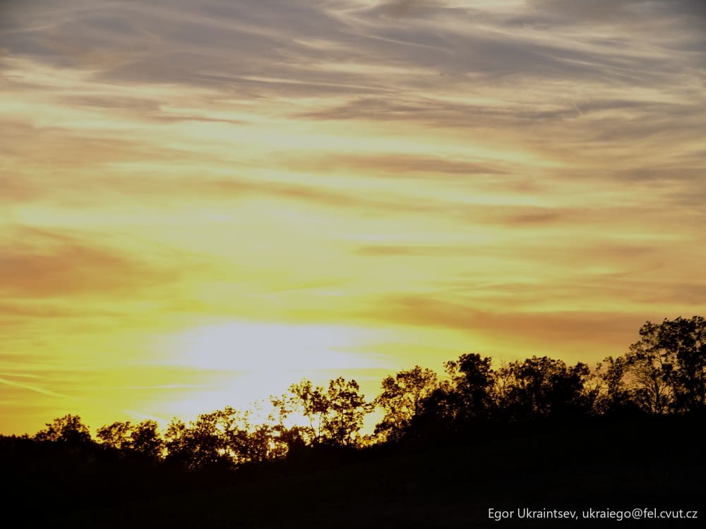 Sun setting in the sky