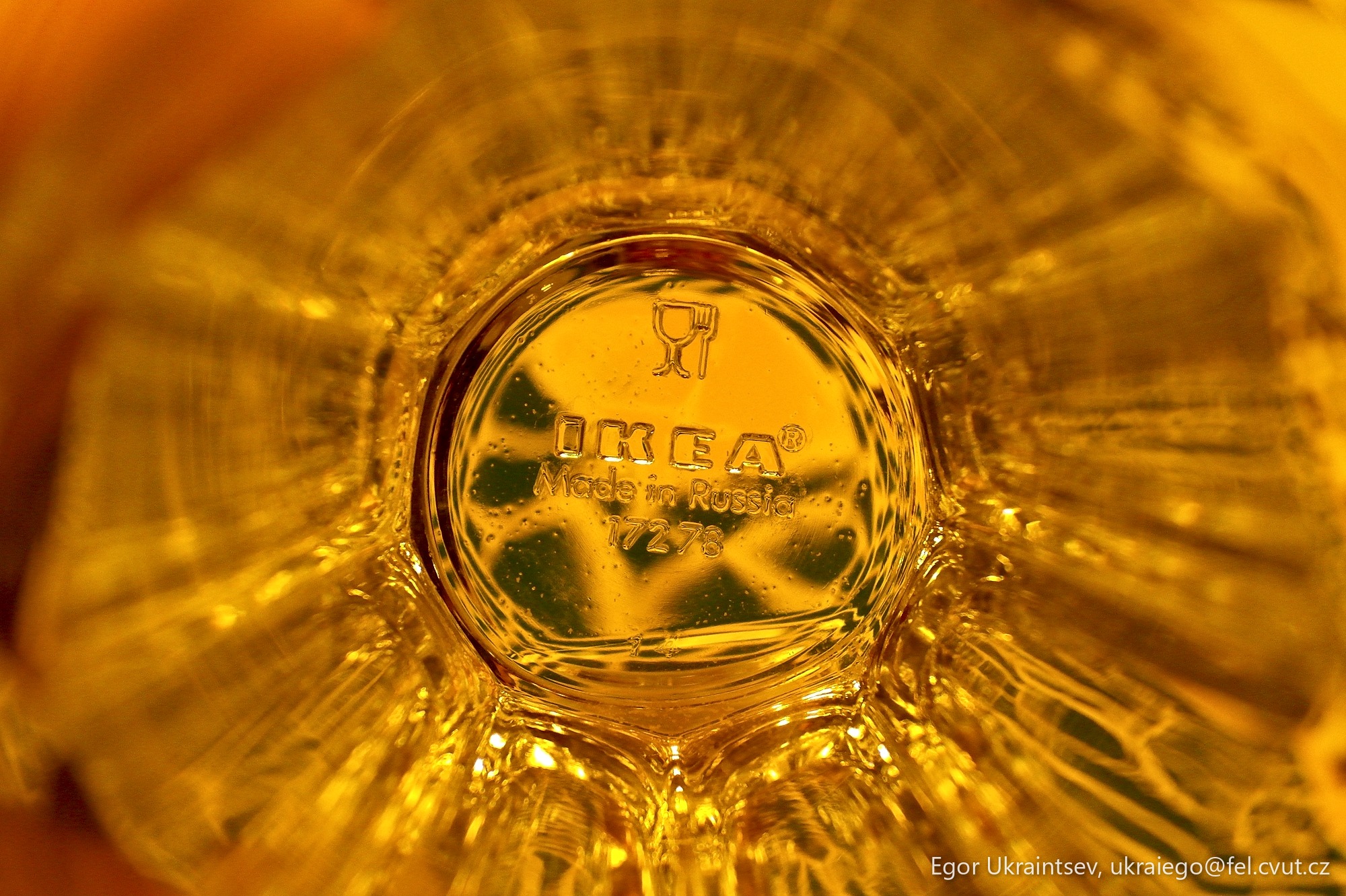 Water drop in a glass