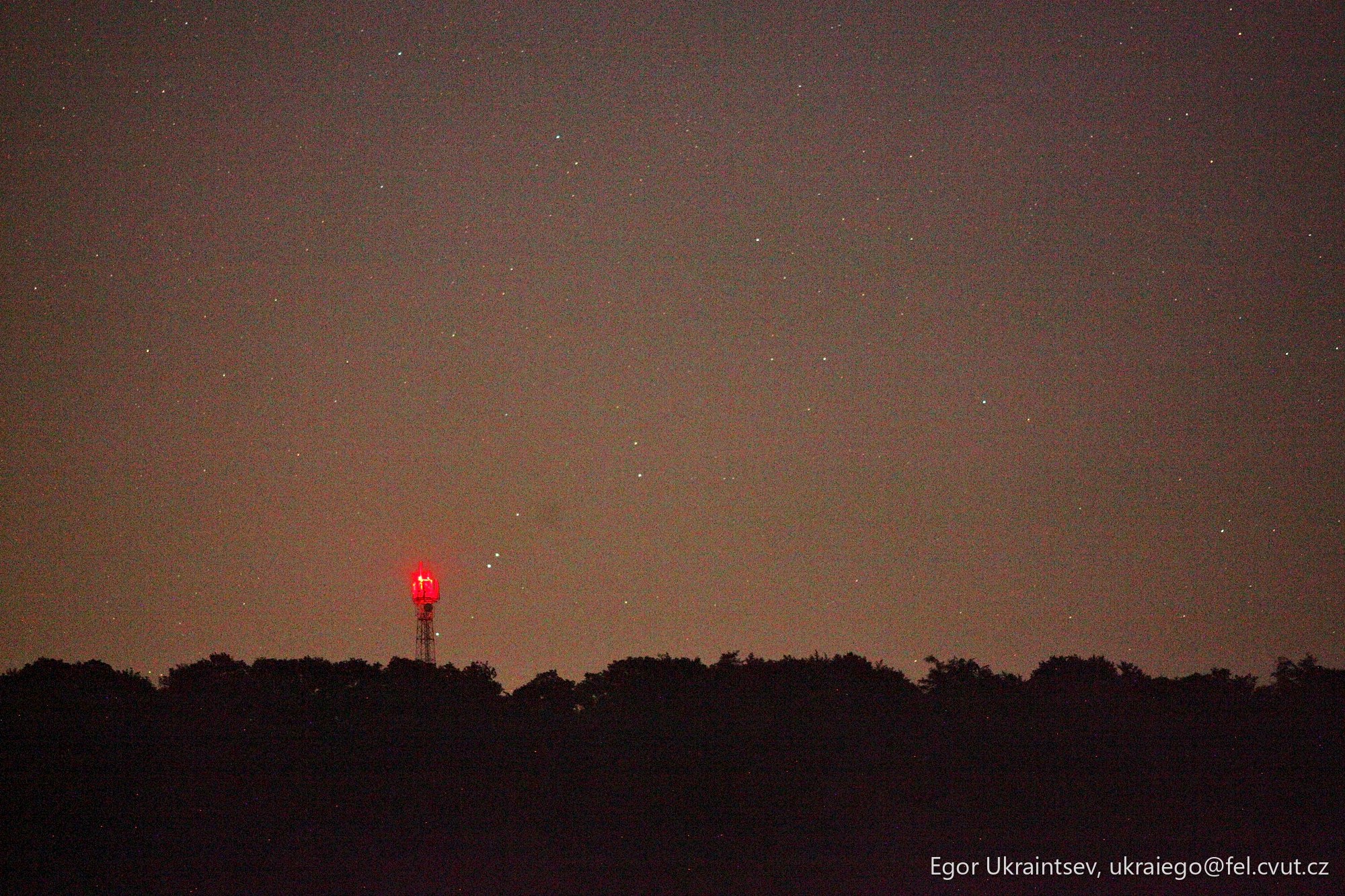Night sky with a red