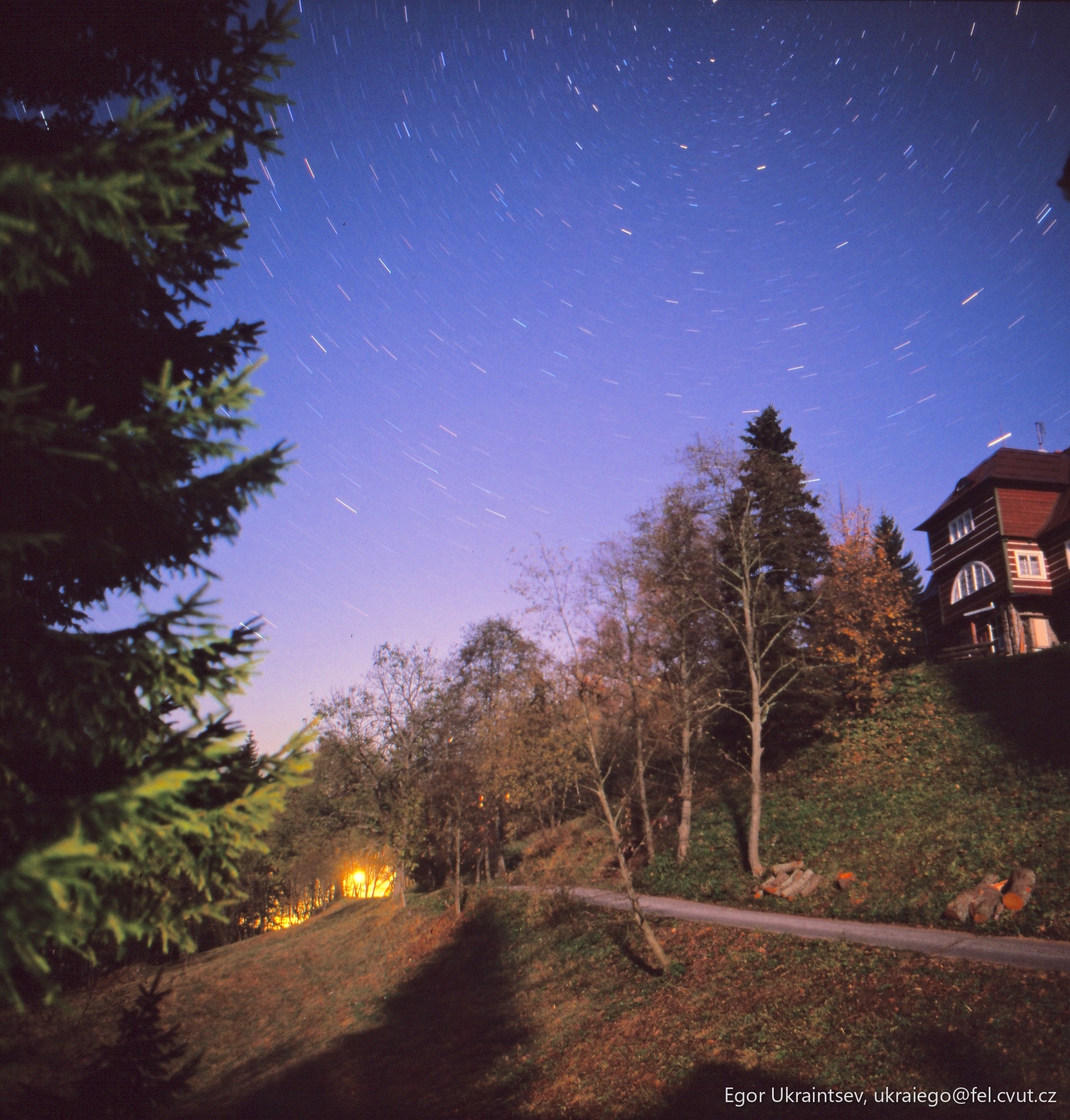 Night sky over a house