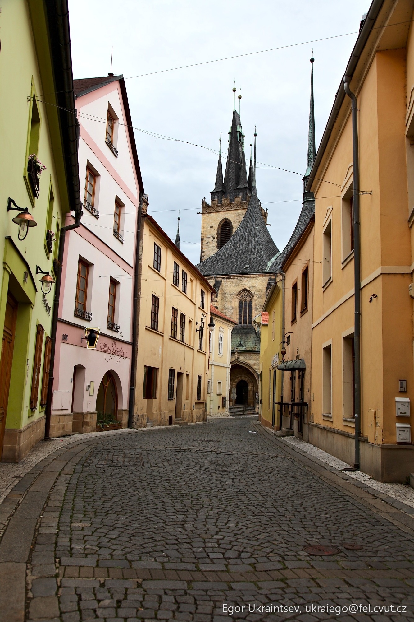 Cobbed street with a church