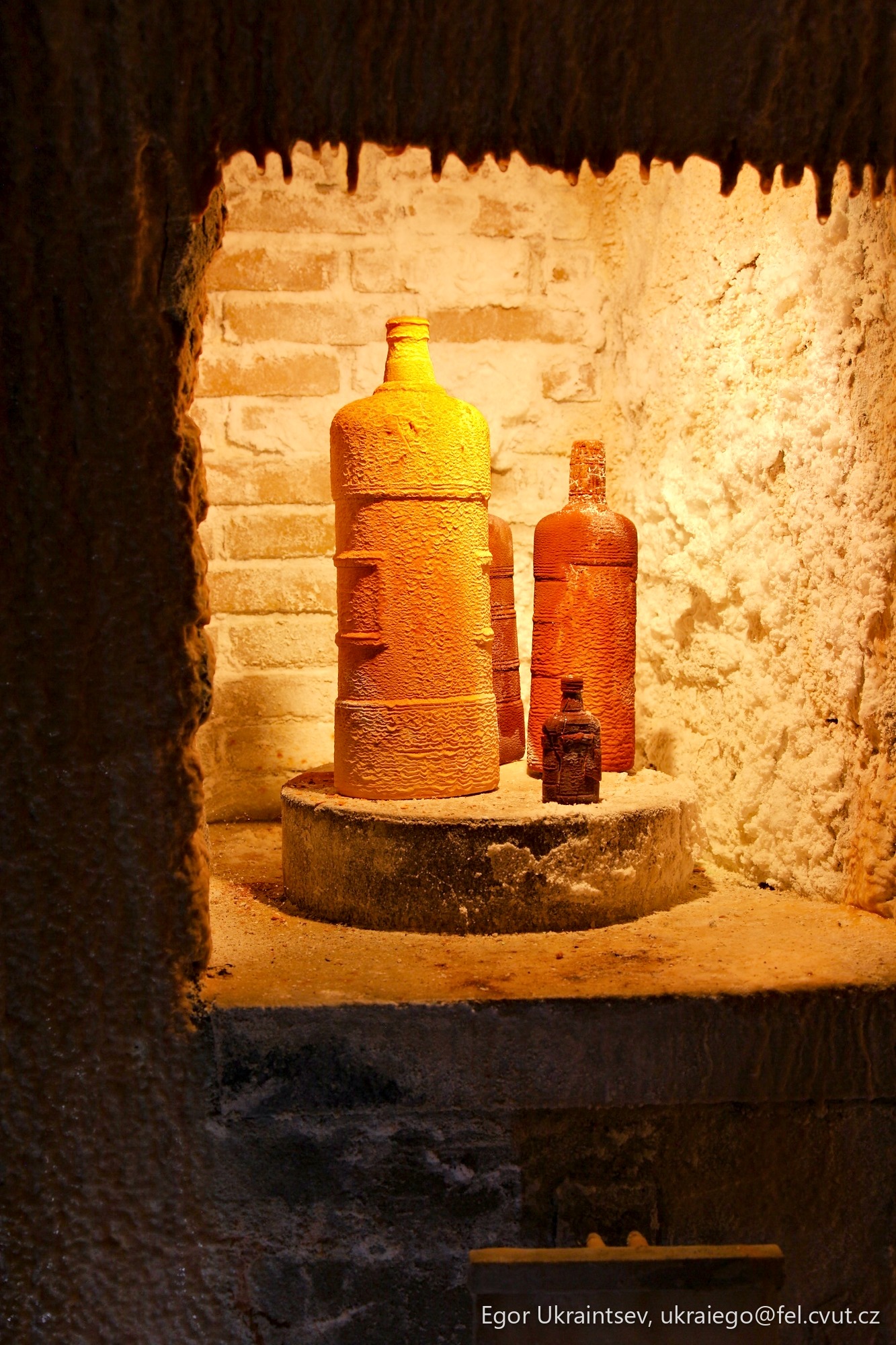 Vases in a stone room