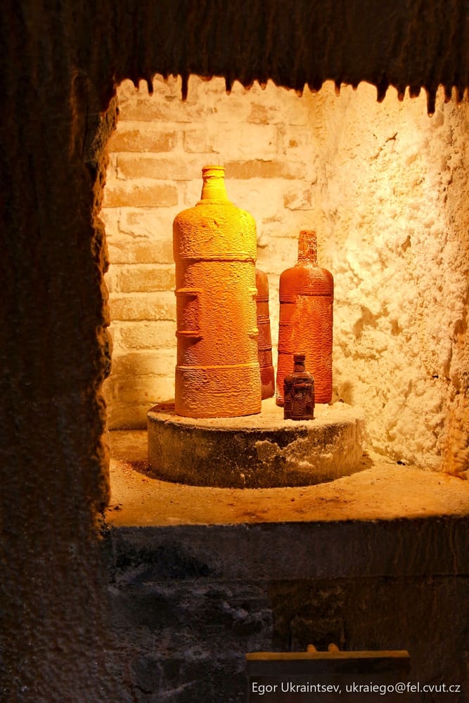 Vases in a stone room