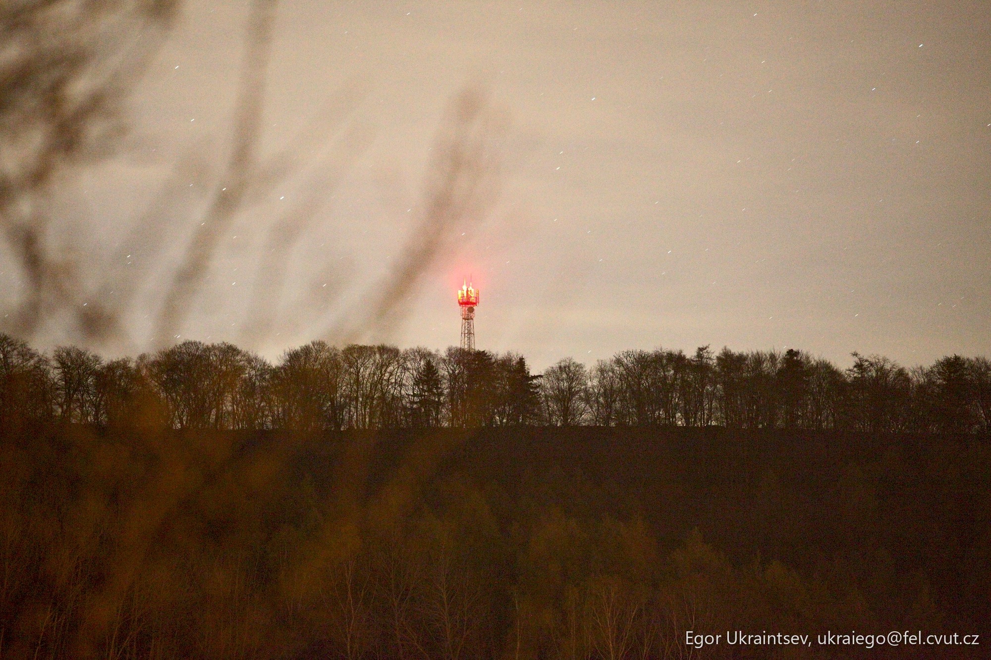 Red light on top of a hill