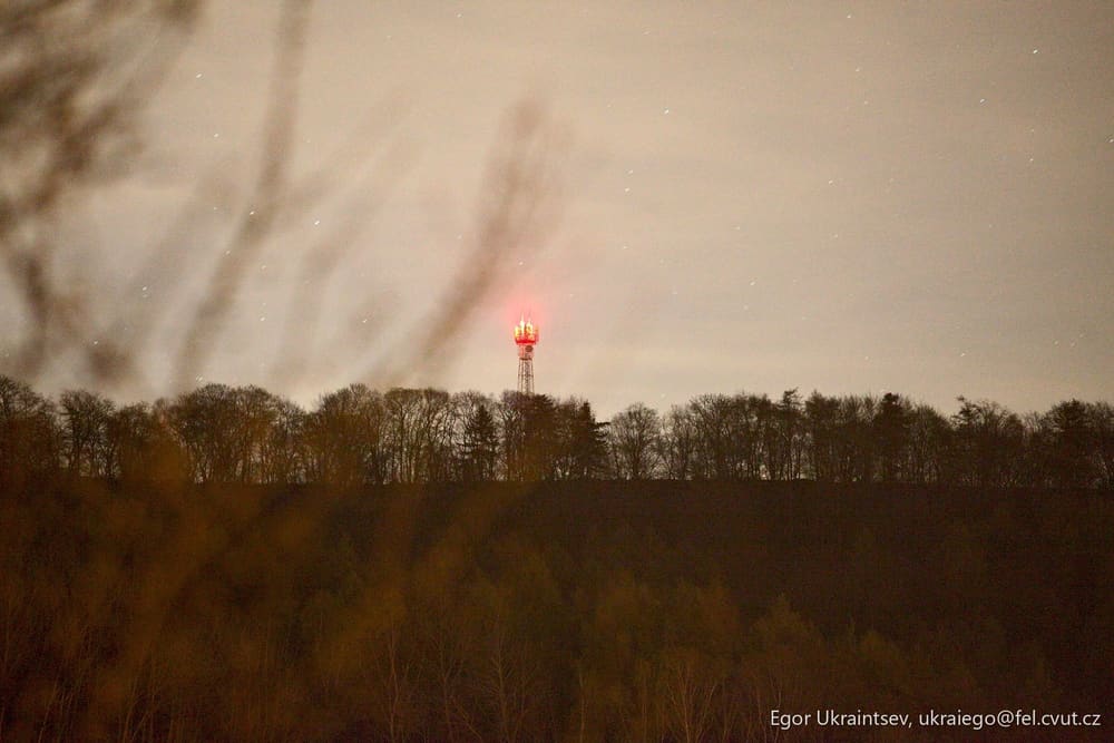 Red light on top of a hill
