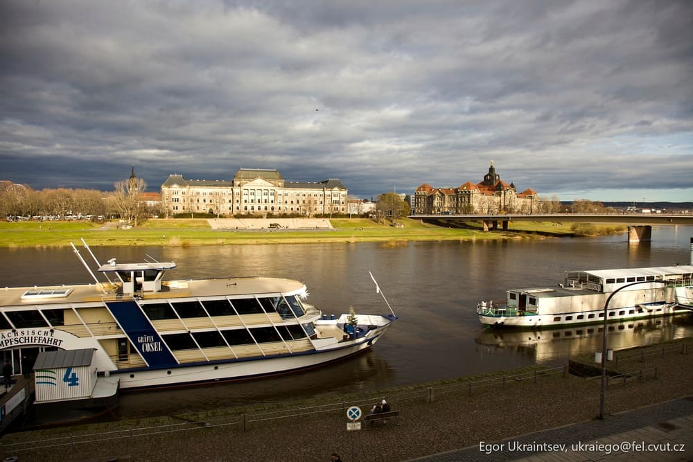 Boats docked on a river