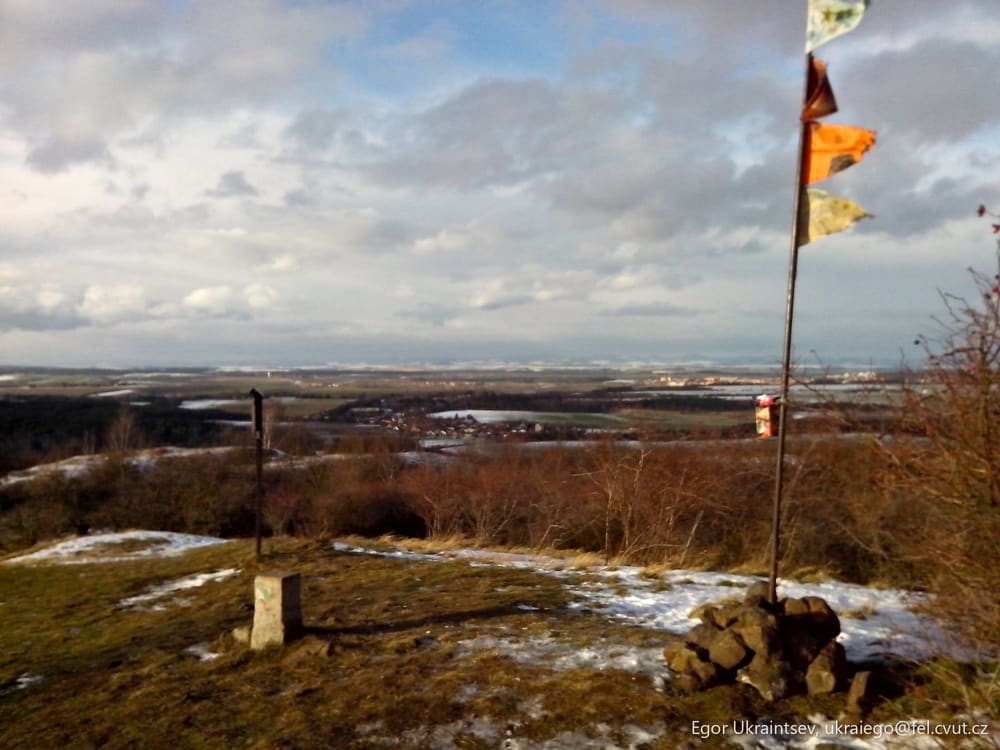 Flag on top of a hill