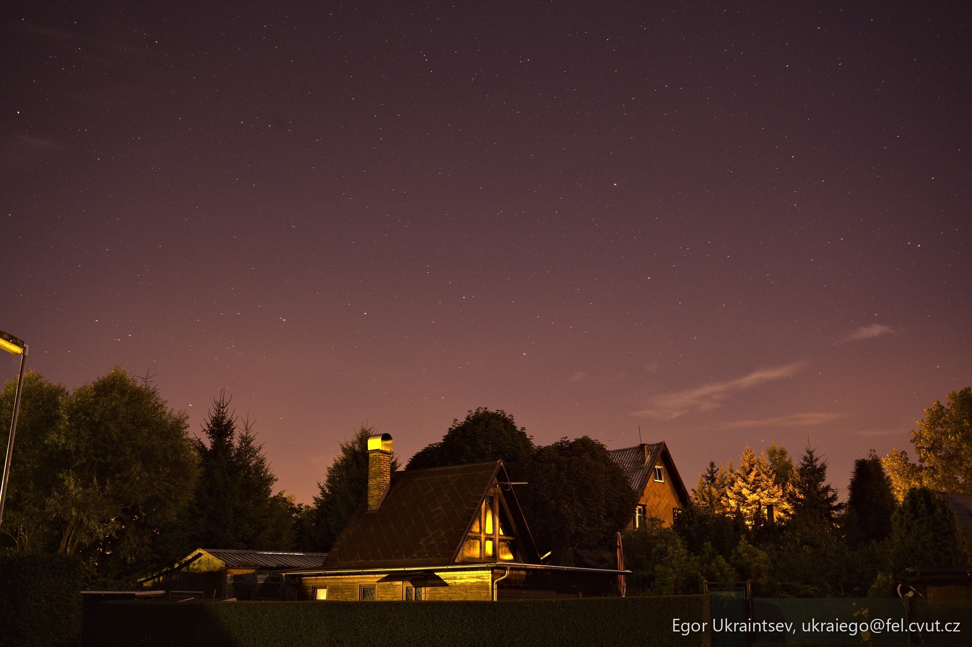 Night sky over a house