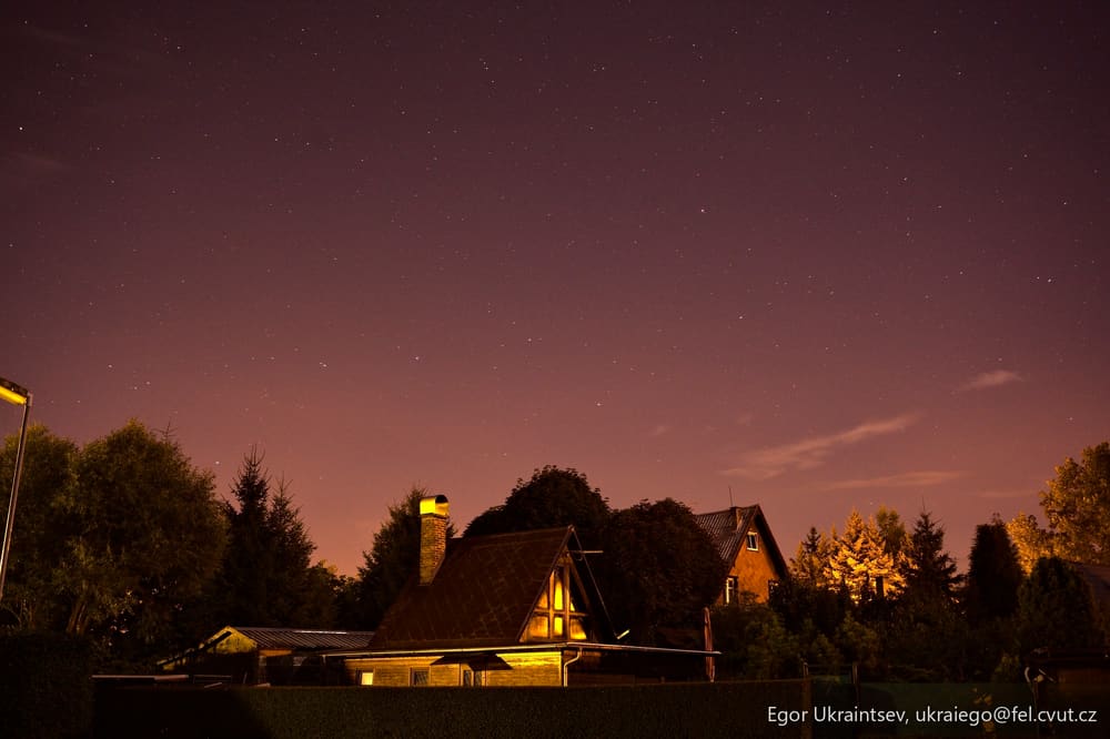 Night sky over a house
