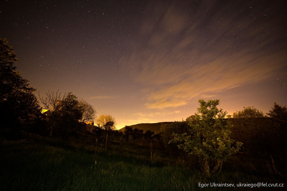 Night sky over a grassy