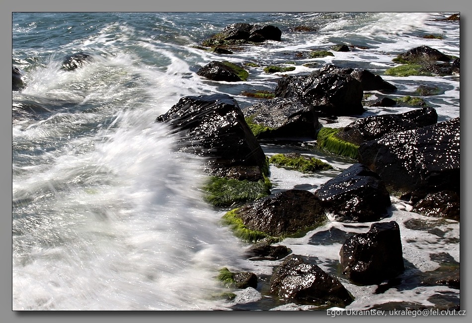 Waves crashing on rocks