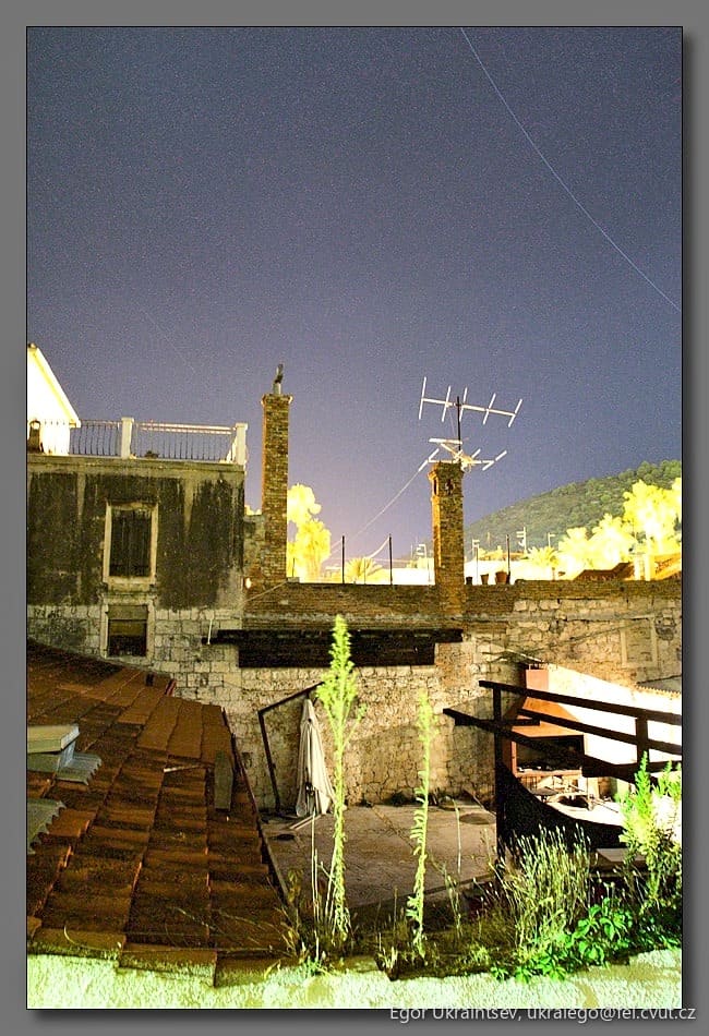 Night sky over the rooftop