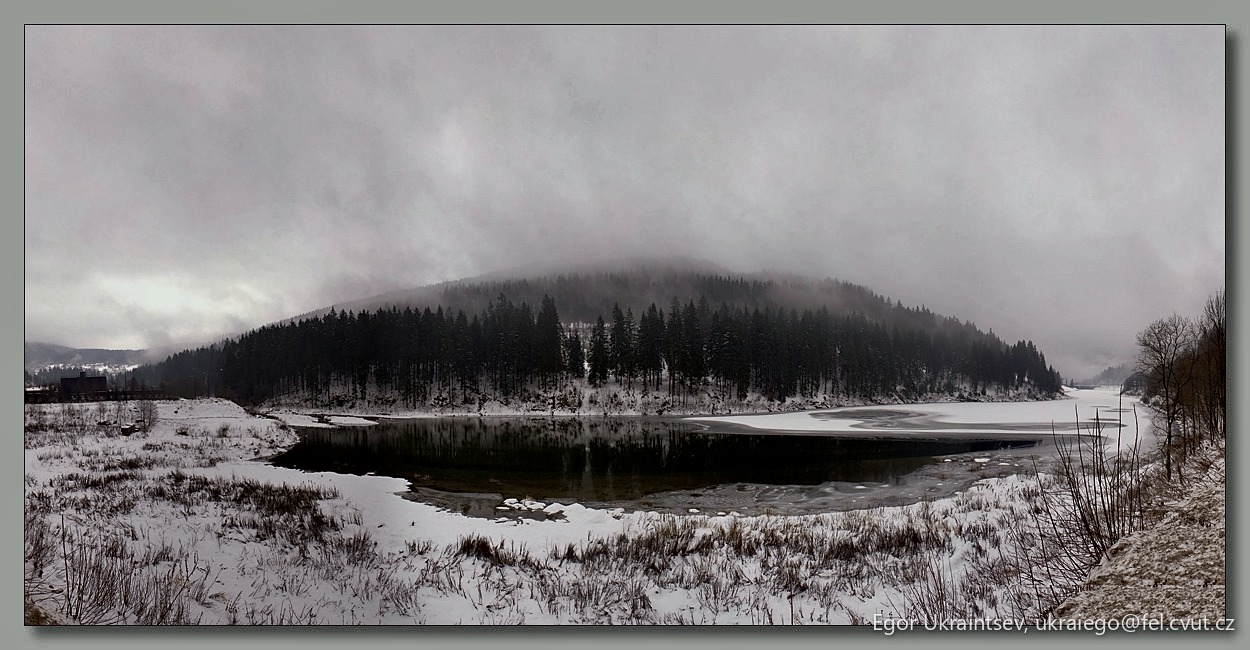 Snowy lake in the mountains