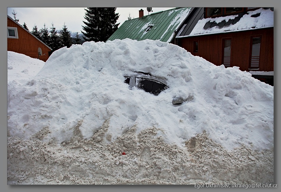 Car buried in a pile