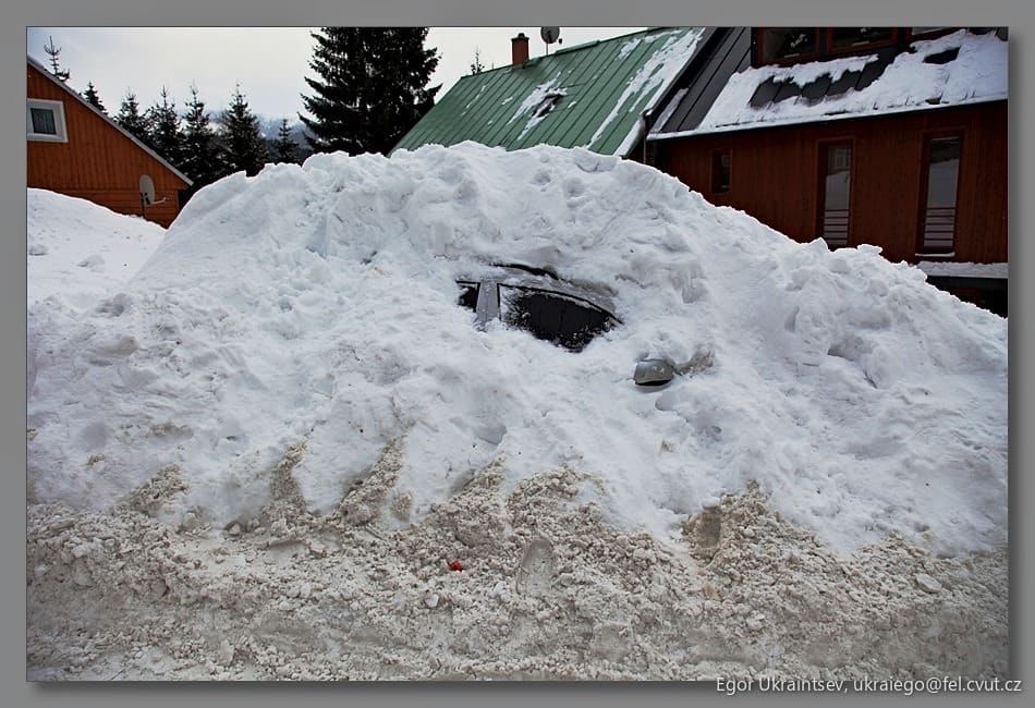 Car buried in a pile