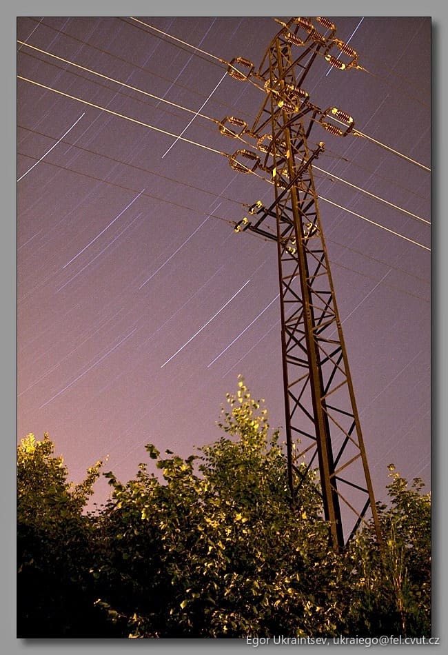 Night sky over a telephone