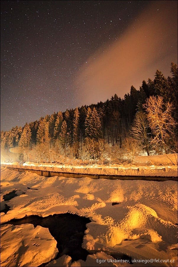 Night sky over a snow