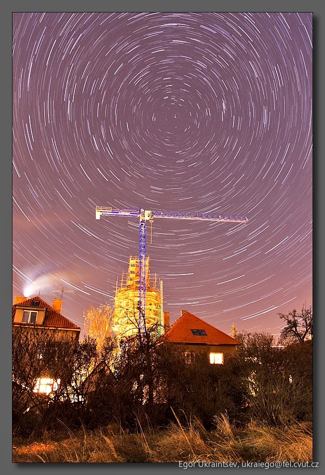 Star trail over a building