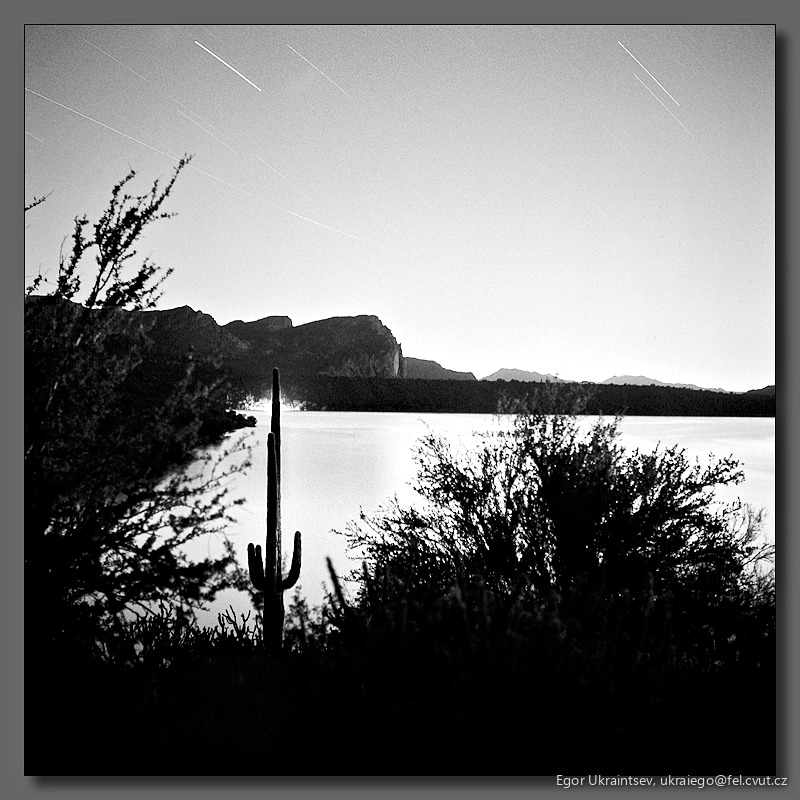 Lake and mountains in black