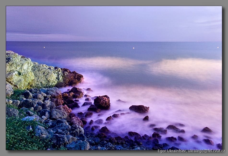Sea and rocks at dusk