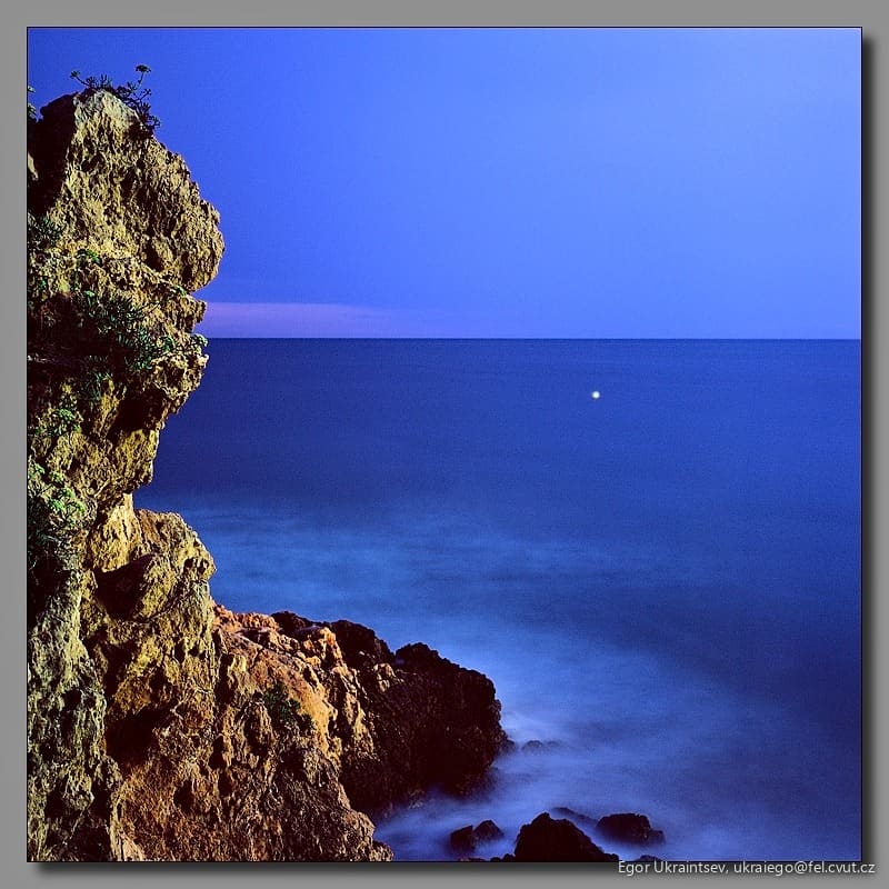 Moon rising over the ocean