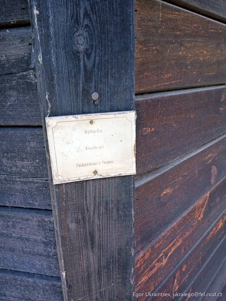 Sign on a wooden wall
