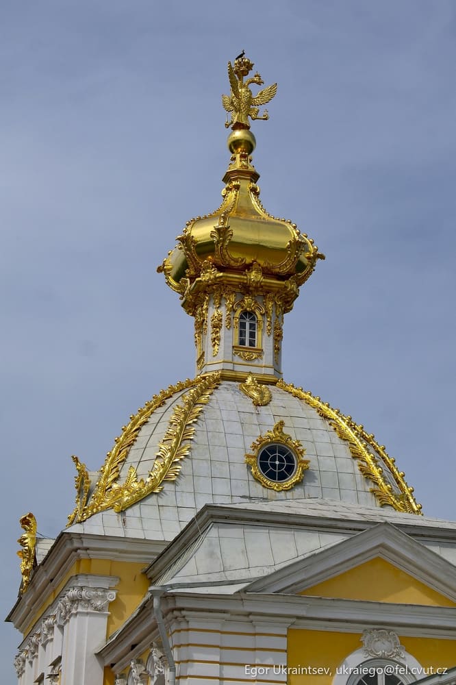 Golden clock on top of a building