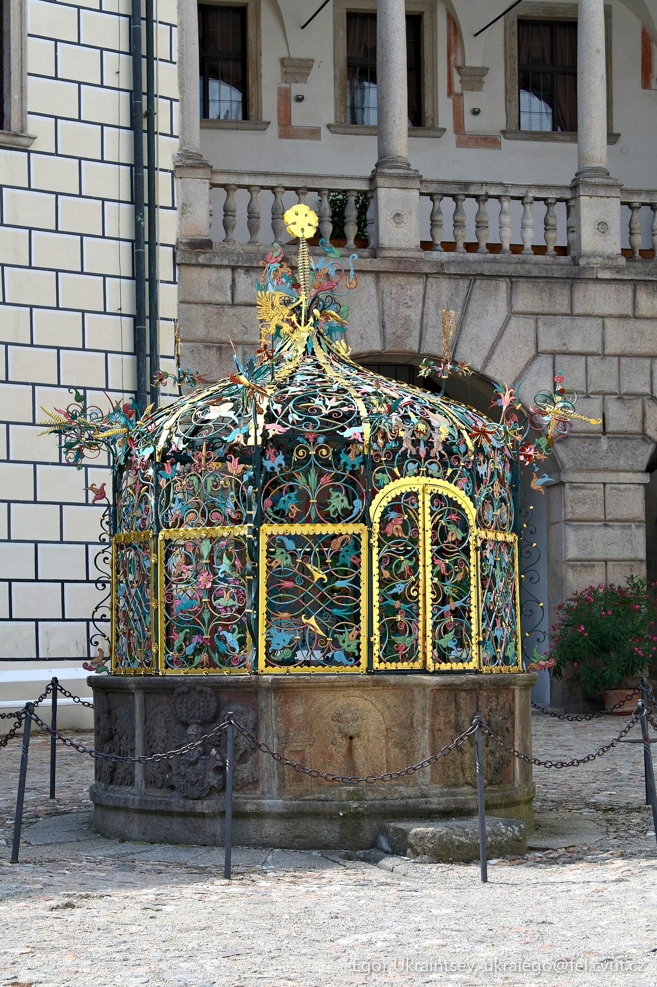 Bird cage in front of a building
