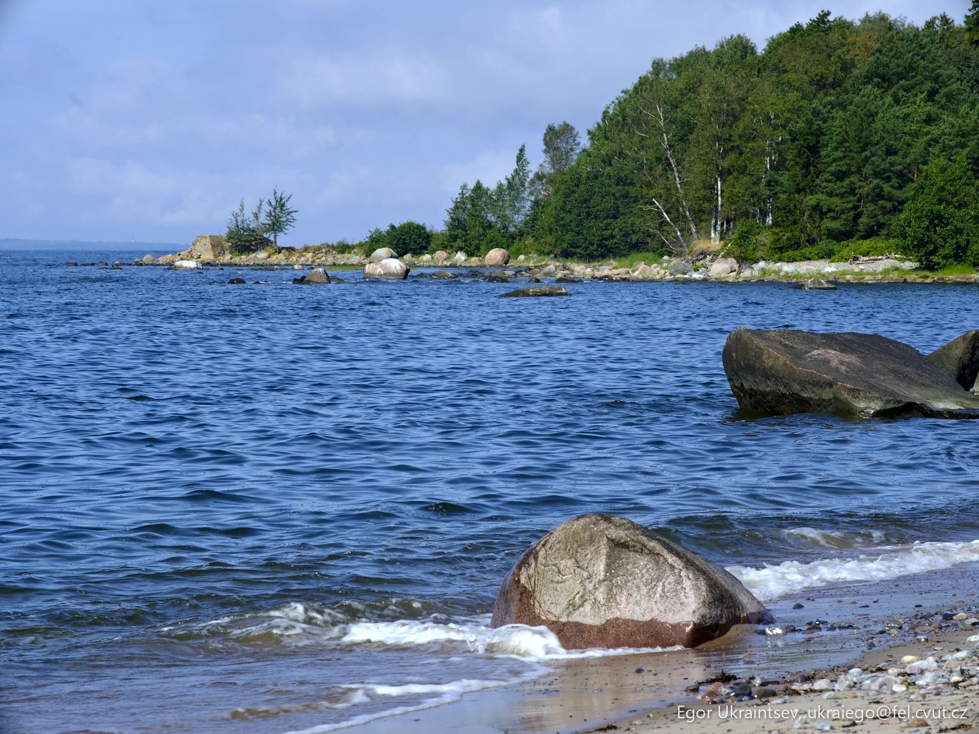 Rocky beach with a large