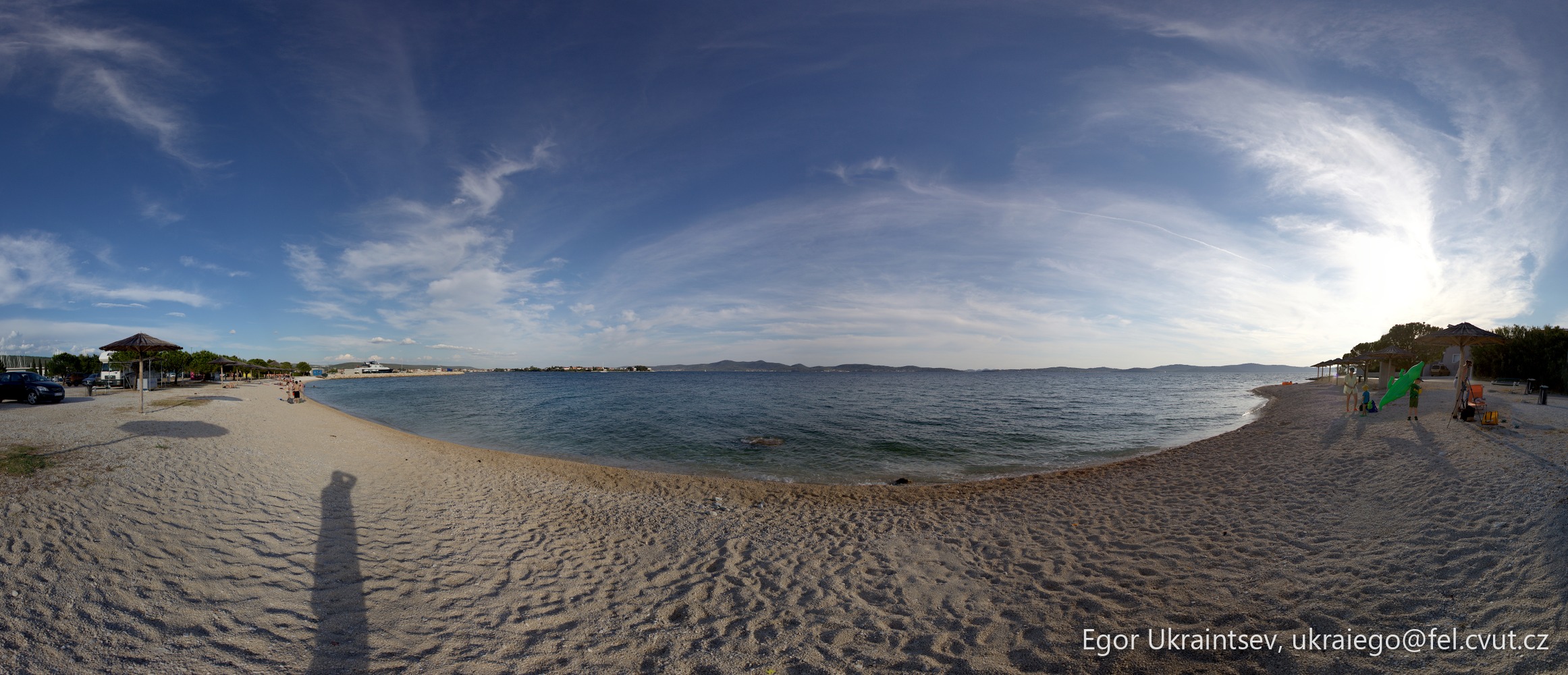 Sandy beach with a blue · Day