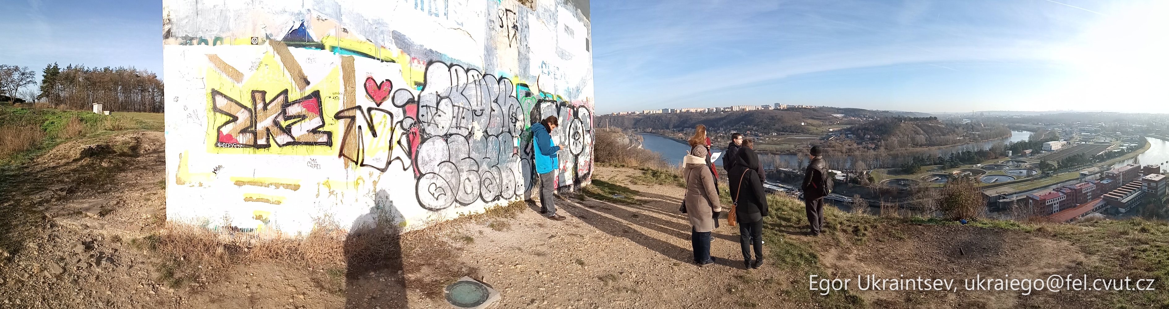People standing in front of a wall · P015 Phone 2019 12