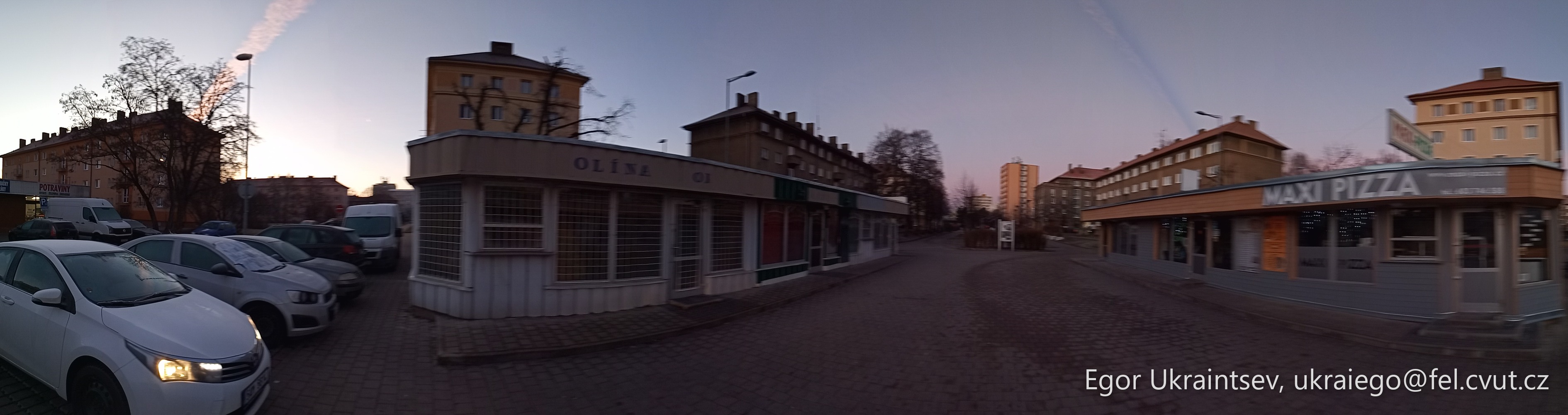 Street with buildings and cars · P031 Phone 2020 01