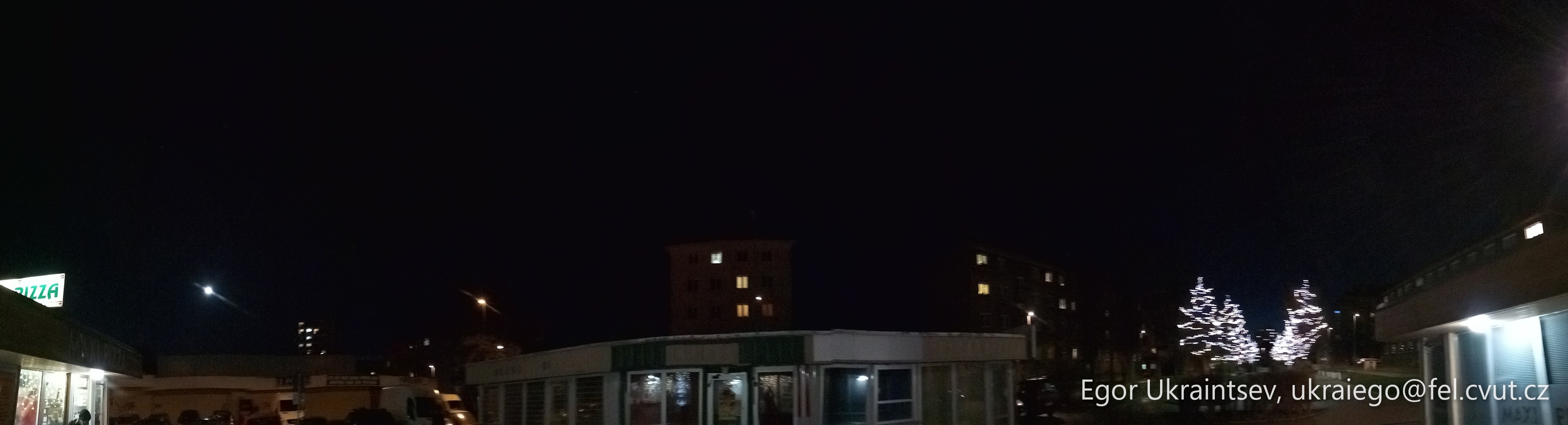 People walking down a street · P053 Phone 2020 12