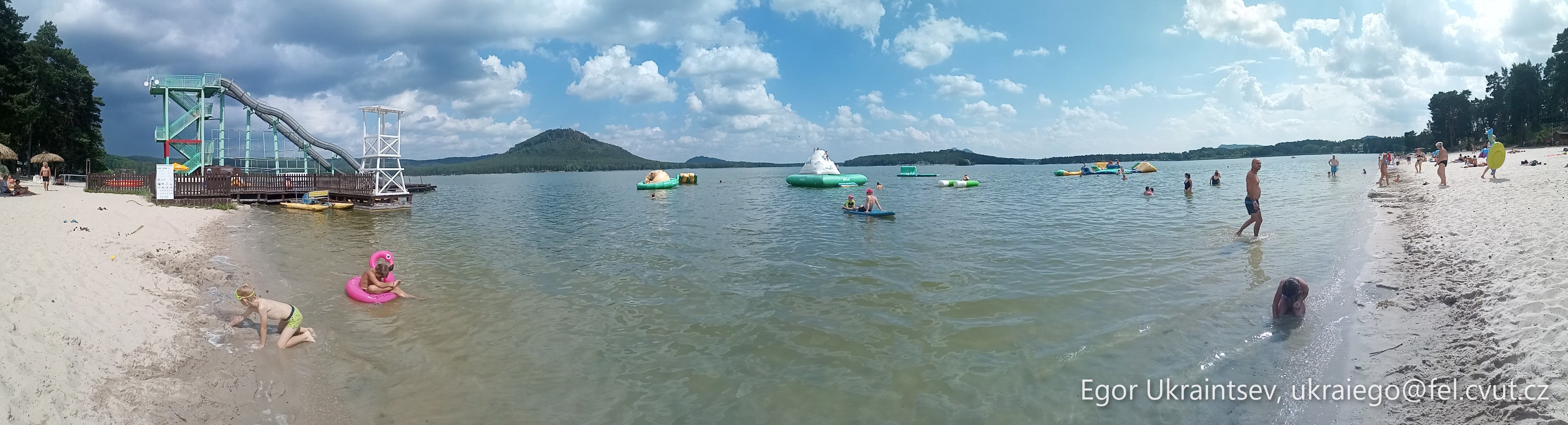 People swimming in a lake · P066 Phone 2022 08